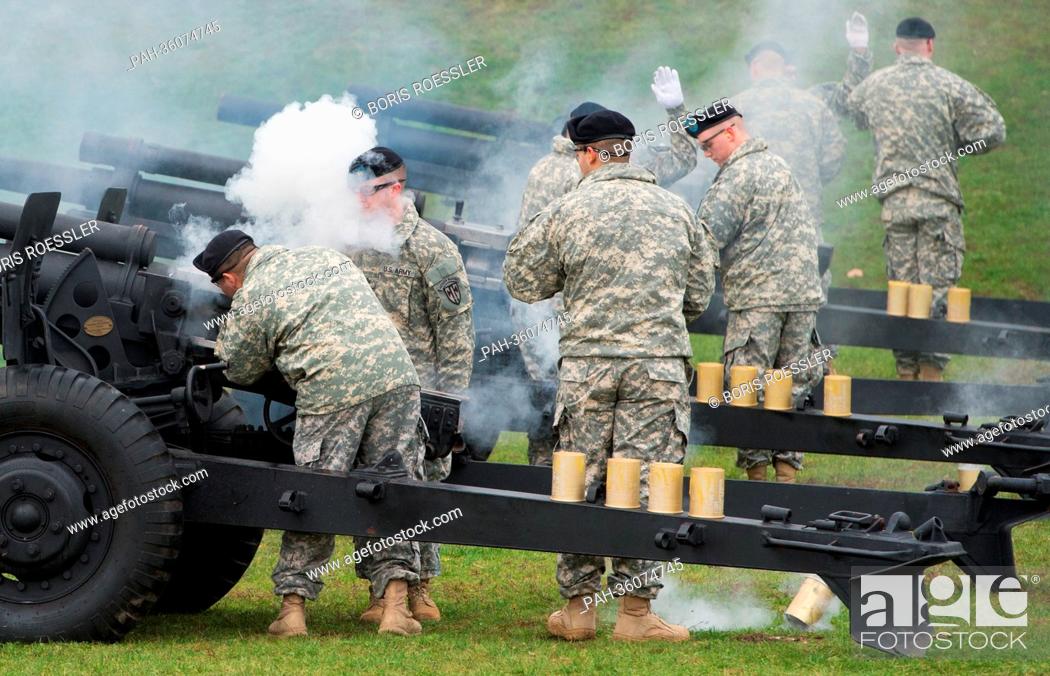 Stock Photo: Soldiers fire guns in salute on the occasion of the taking over of command by Lieutenant General Donald M. Campbell Jr. at US Army Airfield in Wiesbaden.