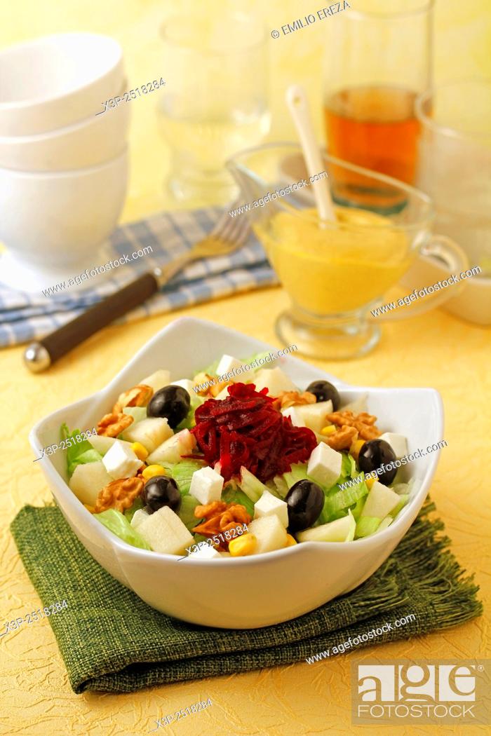 Stock Photo: Salad with pears and walnuts.
