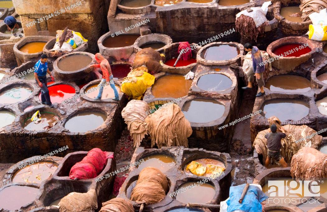 Stock Photo: Fez Morocco old Tannery called Chouara Tannery which is almost 1000 years old from above of tannery vats with color dyes.