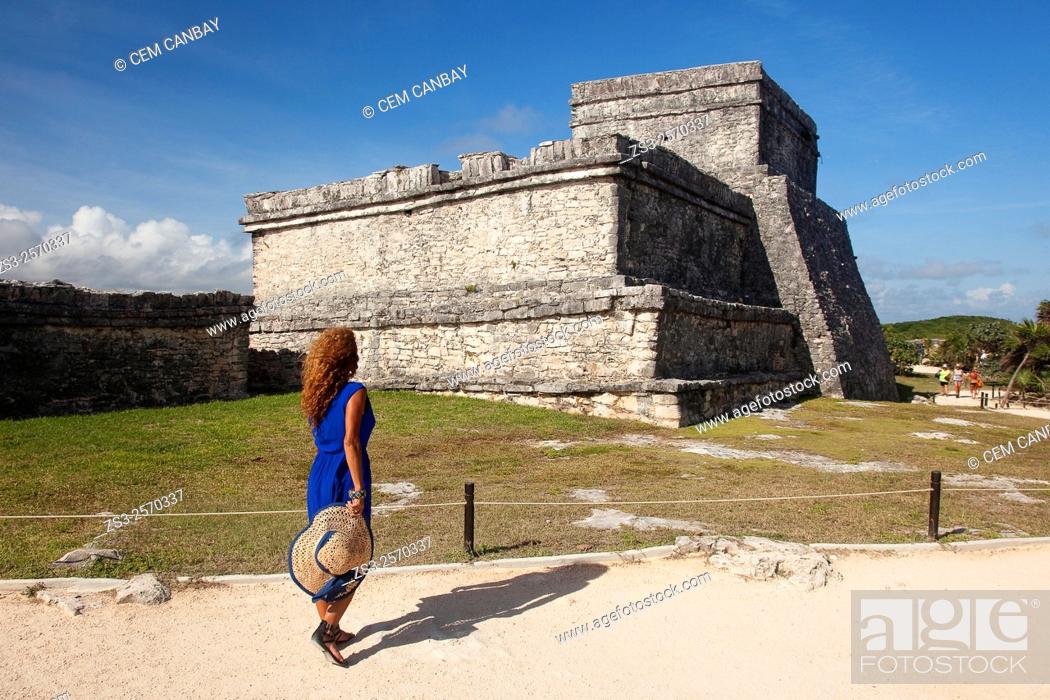 Stock Photo: Woman posing in Mayan Ruins at Maya archeological site of Tulum near the Castle-Castillo, Quintana Roo, Yucatan Province, Mexico, Central America.