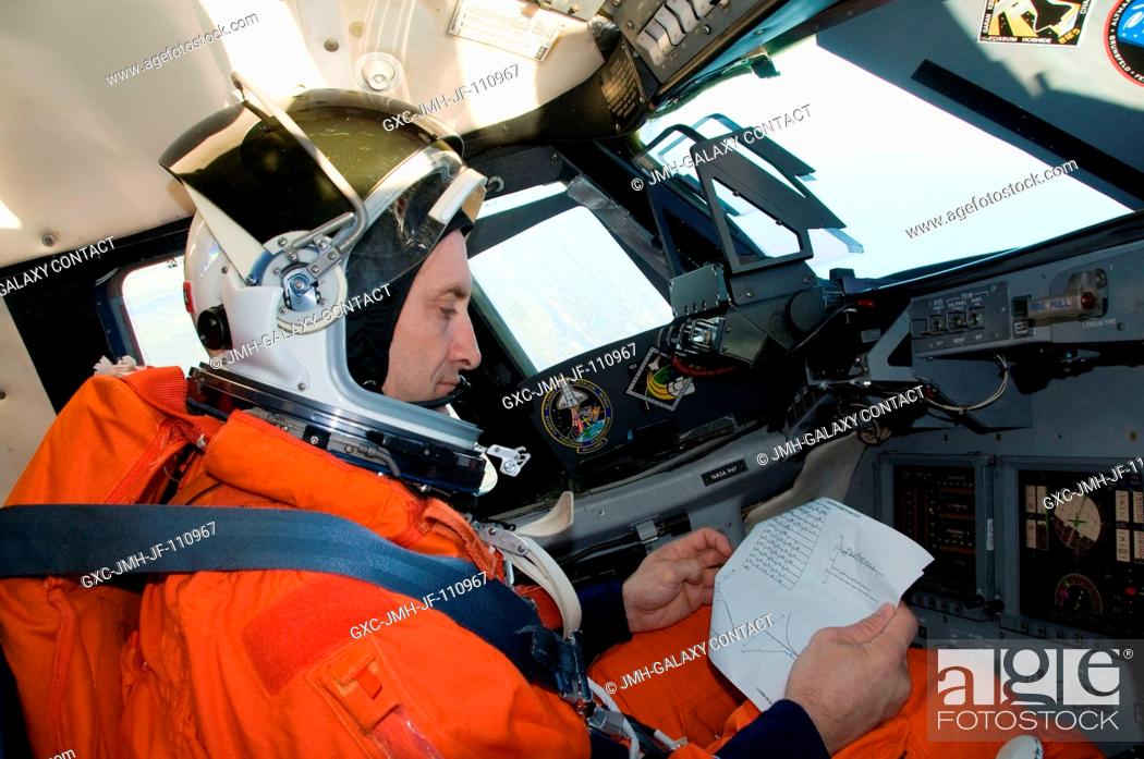 Stock Photo: Astronaut Charles O. Hobaugh, STS-129 commander, flies a Shuttle Training Aircraft (STA) over Kennedy Space Center, Florida, during a training session.