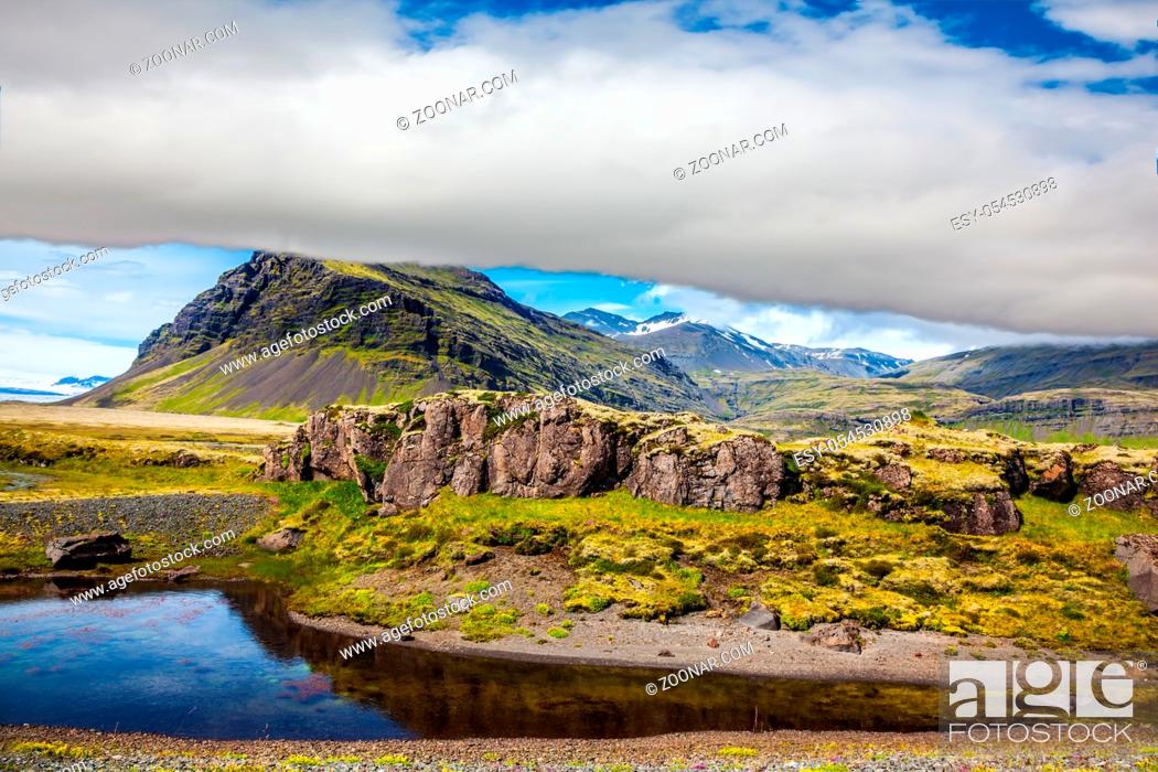 Stock Photo: Summer tour in the Nordic countries. Tundra in Iceland. The concept of extreme northern tourism.