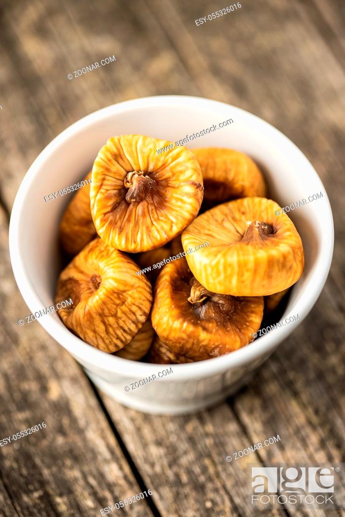 Stock Photo: Sweet dried figs in bowl.