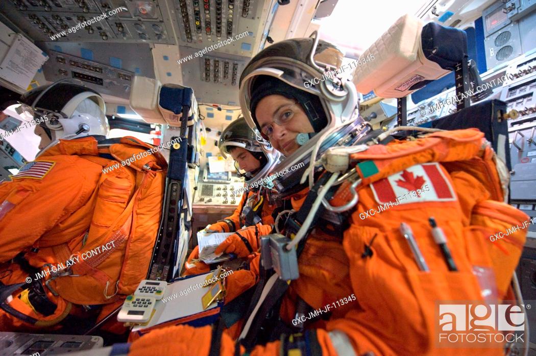 Stock Photo: Canadian Space Agency astronaut Julie Payette (foreground), NASA astronaut Christopher Cassidy, both STS-127 mission specialists.