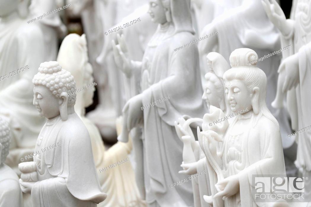 Stock Photo: Quan Am, the bodhisattva of compassion. Marble statue. Ho Chi Minh city. Vietnam. | usage worldwide. - Ho Chi Minh City/Vietnam.