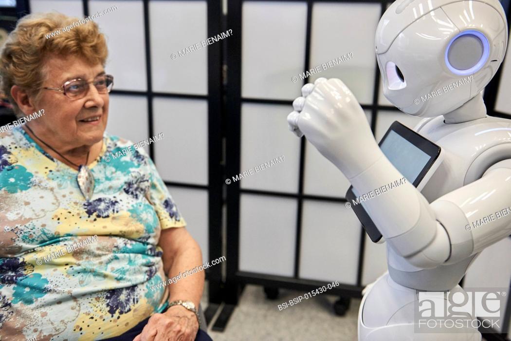 Stock Photo: Reportage in the U1208 Lab at Inserm, which studies cognitive sciences and robot-human communication. The team works with two robots.