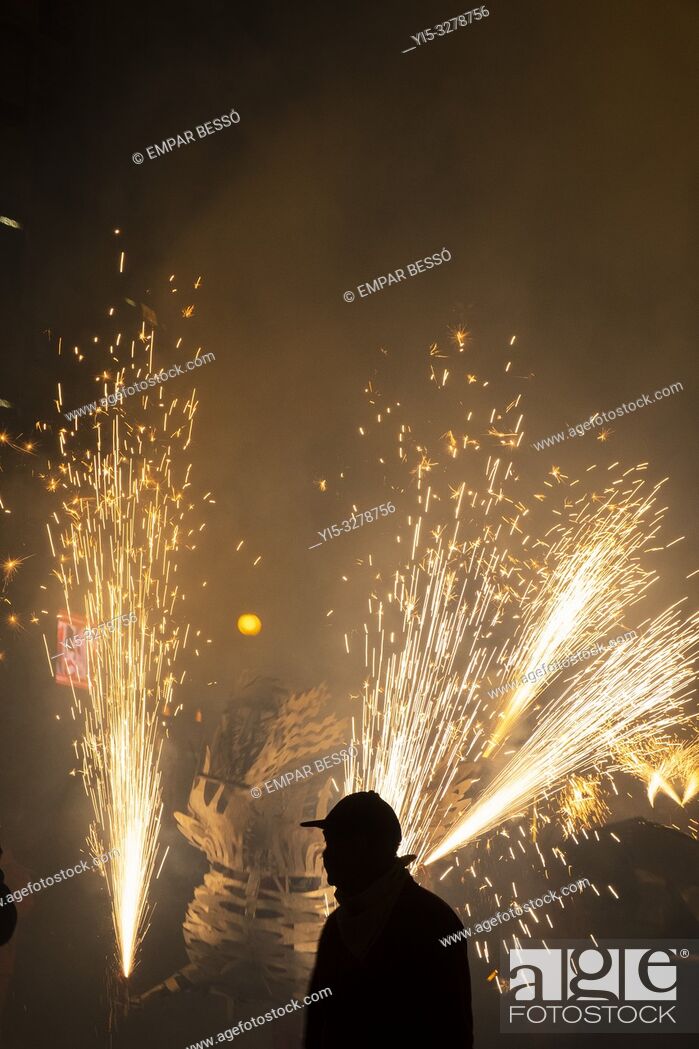 Stock Photo: Correfoc. Street parade with fireworks. Fallas festival. València. Spain. 2019.