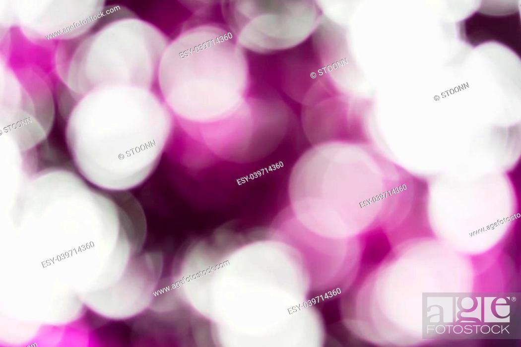 Stock Photo: Blurred lights violet bokeh abstract light background.