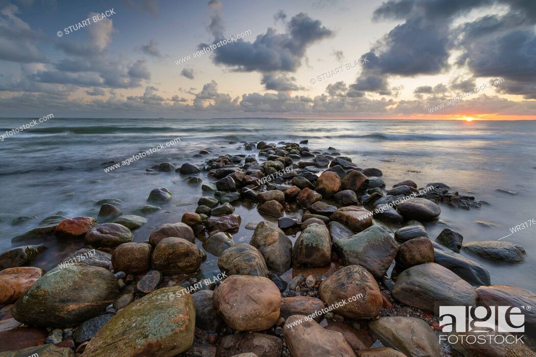 Stock Photo: Rock breakwater in sea at sunrise, Munkerup, Kattegat Coast, Zealand, Denmark, Scandinavia, Europe.