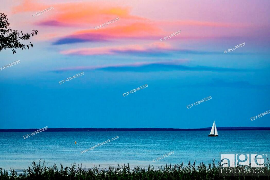 Stock Photo: Sunset View from Mom's Padanaram Deck Summer Sailboat Buzzards Bay Dartmouth Masschusetts.