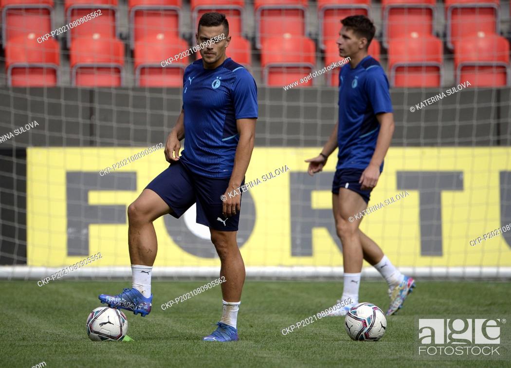 Stock Photo: From left Tomas Holes, Lukas Masopust of Slavia in action during the training session prior to Football Champions League 3rd qualifying round return match:.