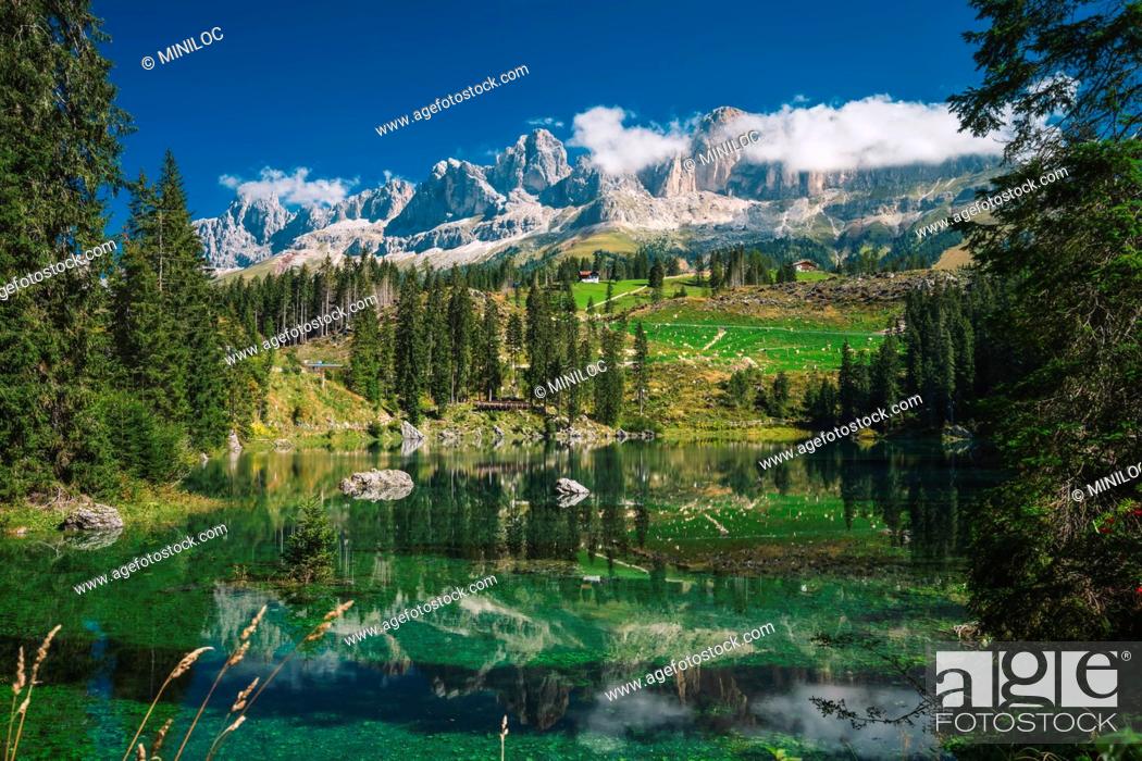 Stock Photo: Carezza lake - Lago di Carezza, Karersee with Mount Latemar, Bolzano province, South tyrol, Italy. Landscape of Lake Carezza or Karersee and Dolomites in.