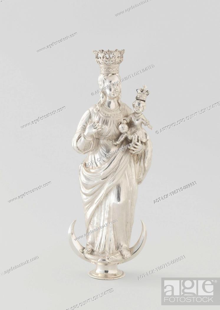 Stock Photo: Crown of staff in the form of Mary with child, Driven and embossed, image of silver representing Maria. On her arm she has the crowned Child with globe.