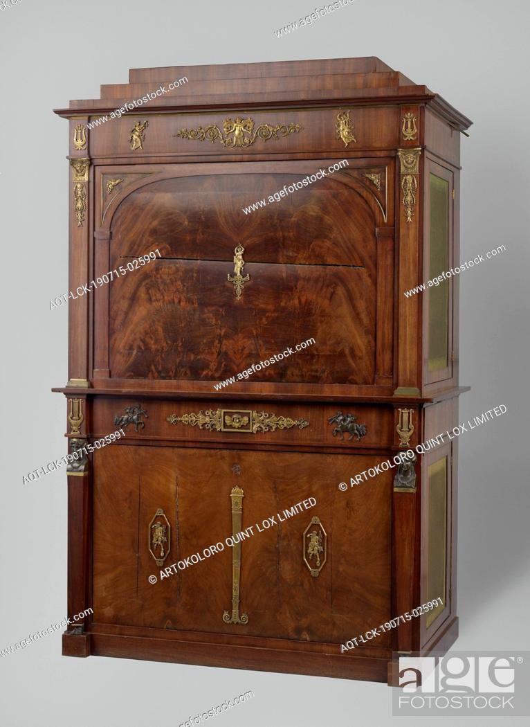 Stock Photo: Salon cylinder organ in the form of a secretary, of oak and mahogany (the flaps of flower plate), the side pockets covered with green boring flaps.