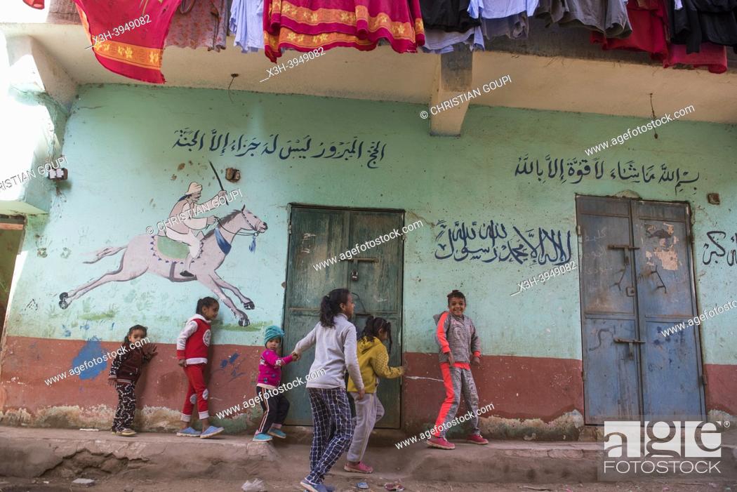 Stock Photo: Children in a street of the village of Ramadi, west bank of the Nile south of Edfu, Egypt, North East Africa.