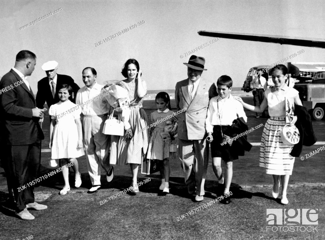 Stock Photo: July 10, 1957 - Paris, France - British actor CHARLIE CHAPLIN with his wife OONA and children at the airport. Sir Charles Spencer Chaplin, Jr.