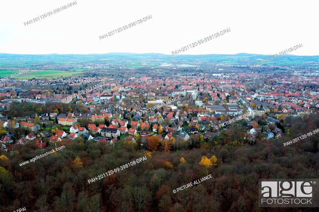 Stock Photo: 19 November 2020, Lower Saxony, Göttingen: View over southern Lower Saxony with the Göttingen Forest, the city of Göttingen and the Hoher Hagen on the horizon.
