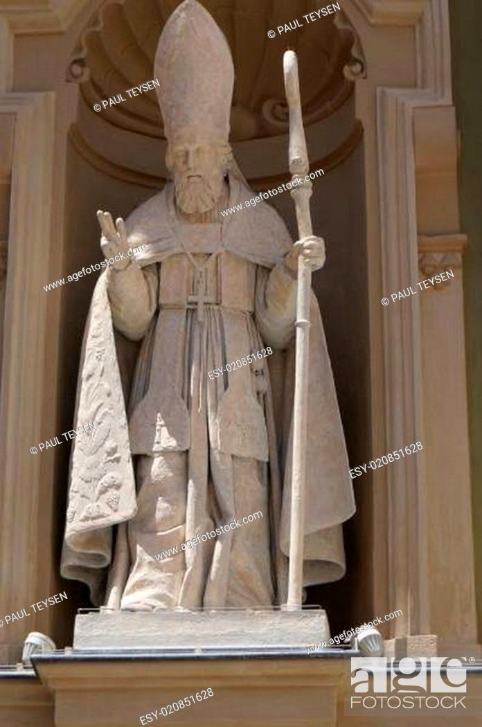 Stock Photo: A statue at the facade of a Church in Nice, France.