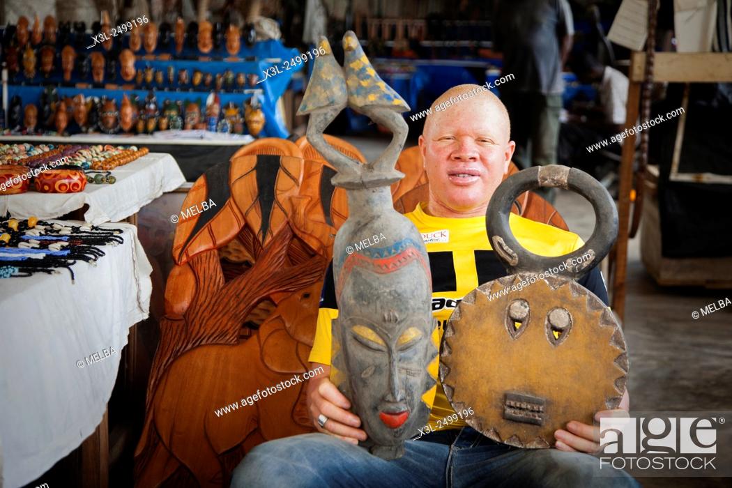 Stock Photo: Albino in craft shop, Grand Bassam, Ivory Coast.