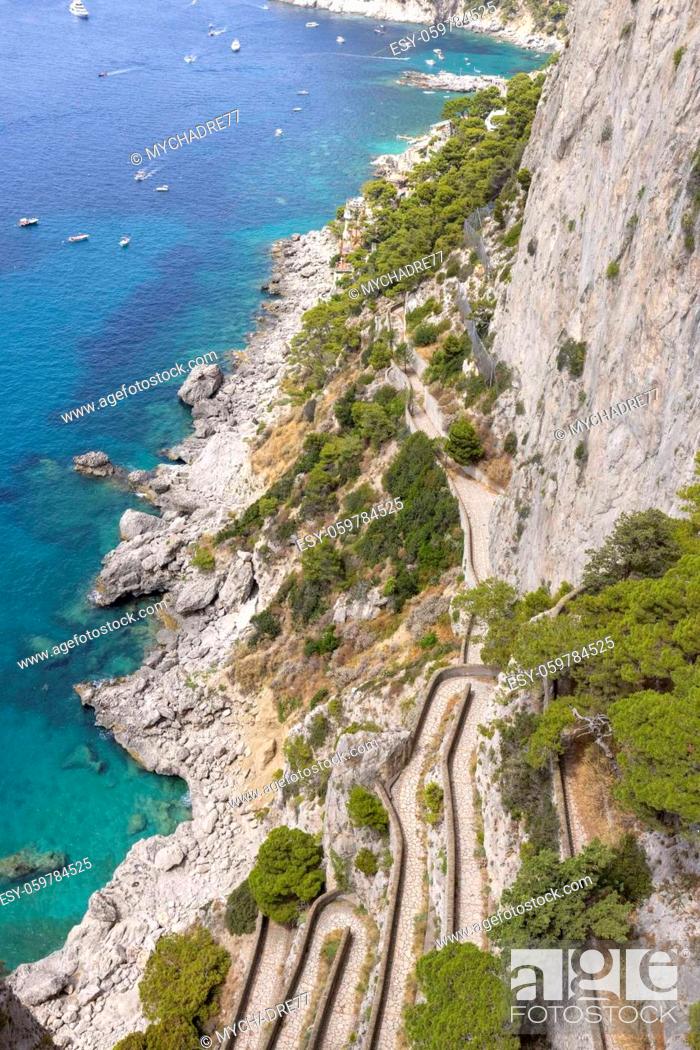 Stock Photo: Rocky shoreline on the Tyrrhenian Sea nearby Marina Piccola, view of the footpath Via Krupp, Capri Island, Italy.