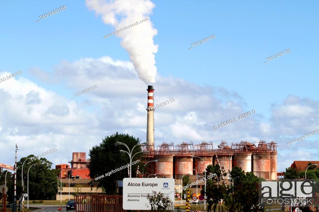 Stock Photo: Tall chimney of the factory Alumina, Alcoa Europe. San Cibrao, on the Galician coast, in the province of Lugo.