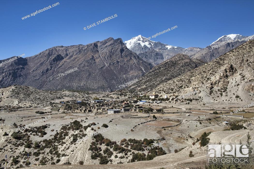 Stock Photo: The beautiful Tibetan stone village of Ngawal and Chulu East peak, Upper Mustang, Nepal.