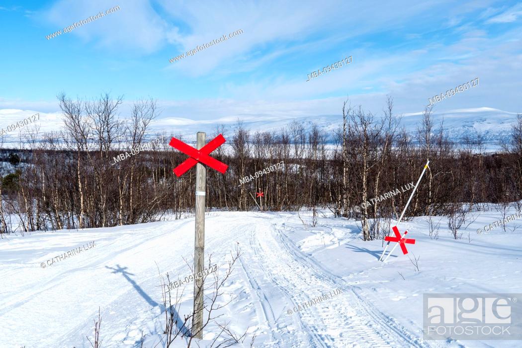 Stock Photo: Sweden, Lapland, Abisko NP, snowmobile trail, marking.