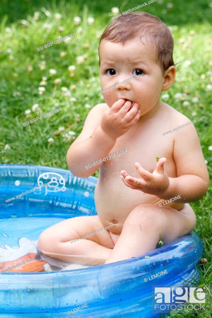 A 13-month old baby girl in her paddling pool, Stock Photo, Picture And  Rights Managed Image. Pic. BSI-BSIP-013567-004 | agefotostock