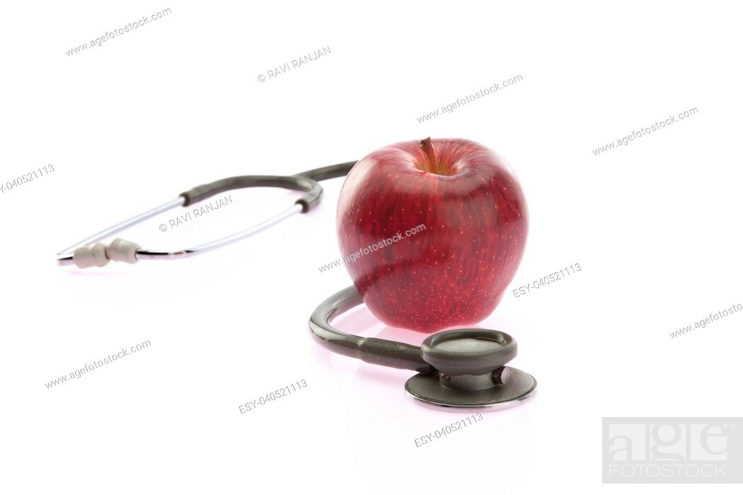 Stock Photo: Apple and stethoscope.