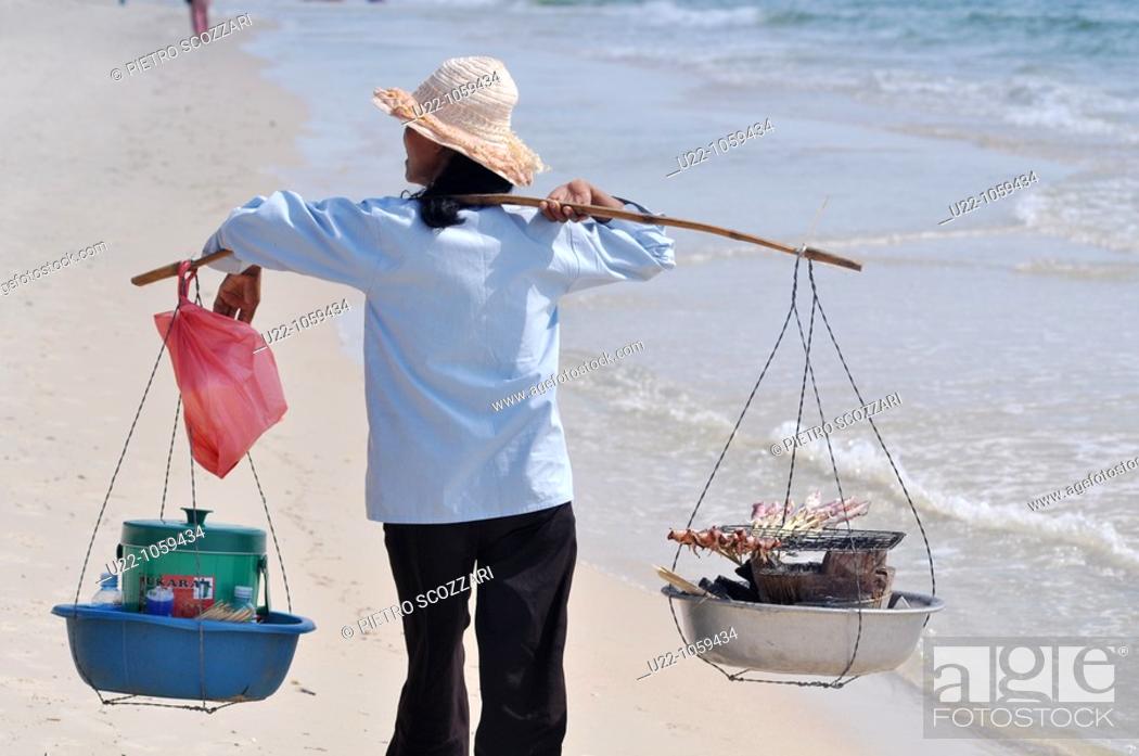 Stock Photo: Sihanoukville (Cambodia): food seller at Occheuteal Beach.