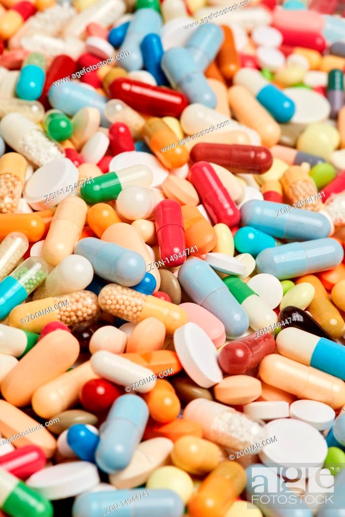 Stock Photo: Hintergrund mit vielen verschiedenen bunten Medikamenten und Pillen.
