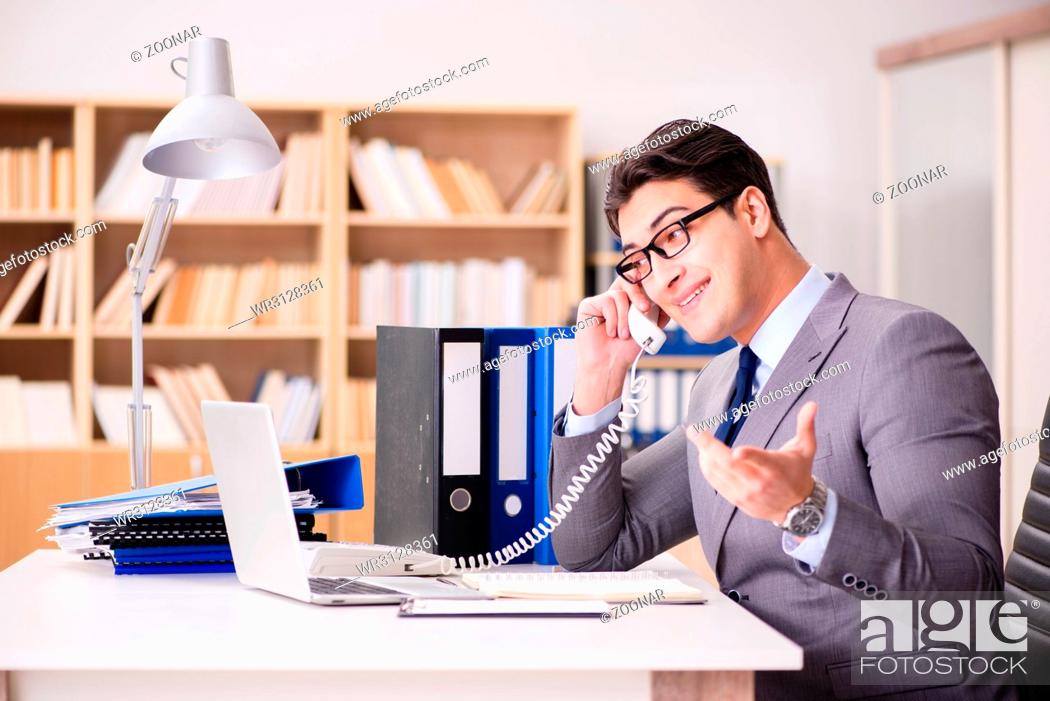 Photo de stock: The businessman working in the office.