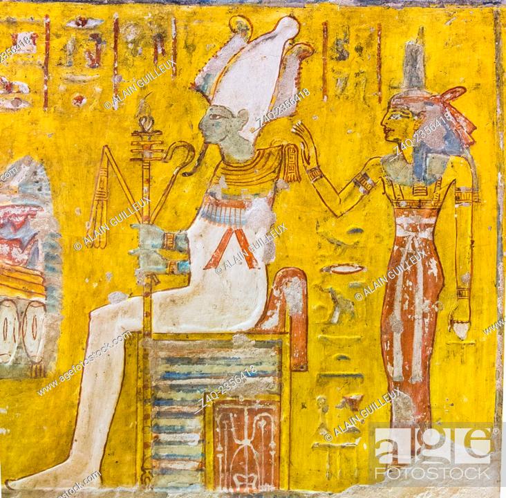 Stock Photo: UNESCO World Heritage, Thebes in Egypt, Valley of the Nobles, tomb of Neferronpet. The god Osiris seats on a throne, wears an Atef crown and a collar with.