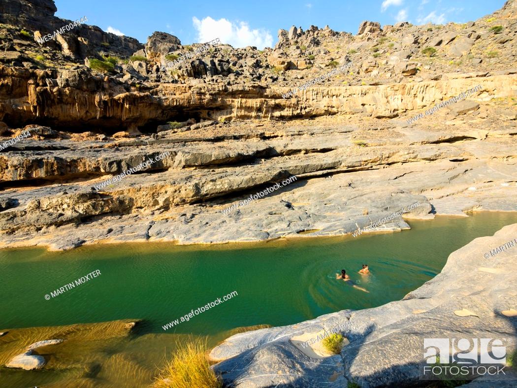 Oman, Wadi Damm, two young woman swimming, Stock Photo, Picture And