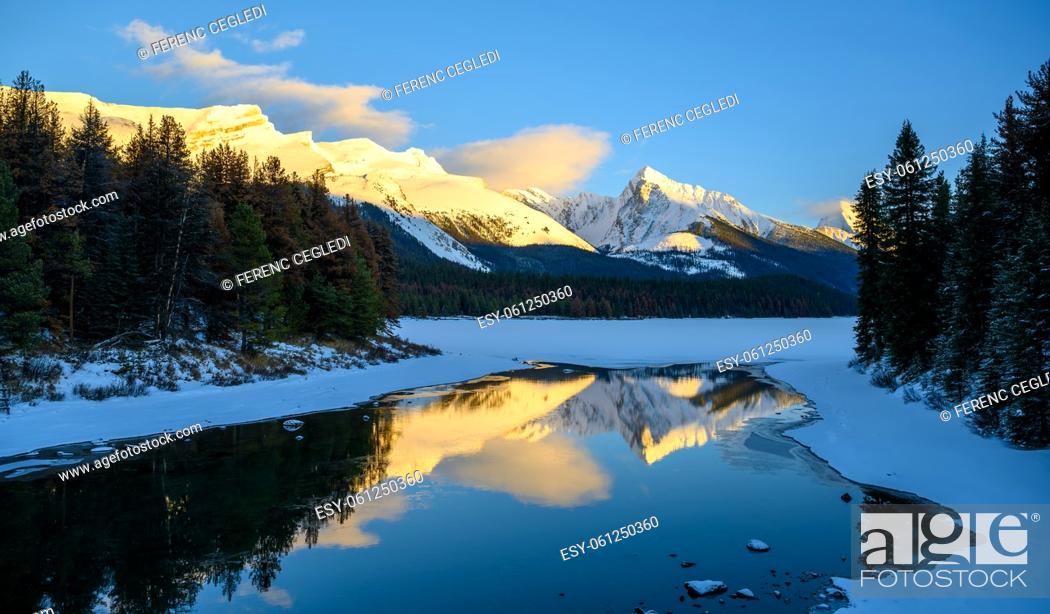 Stock Photo: The Maligne Lake with Queen Elizabeth Ranges in the background in freezing winter weather. Jasper National Park, Alberta, Canada.