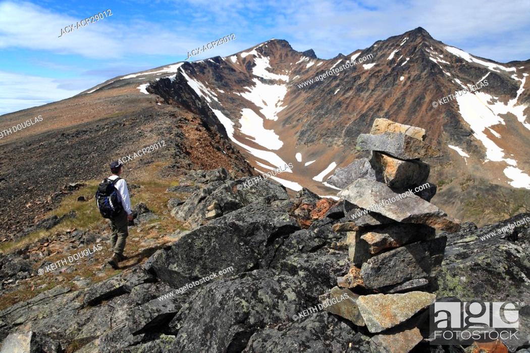 Stock Photo: Hiker on trail up to peak of Hudson Bay Mountain, Smithers, British Columbia.