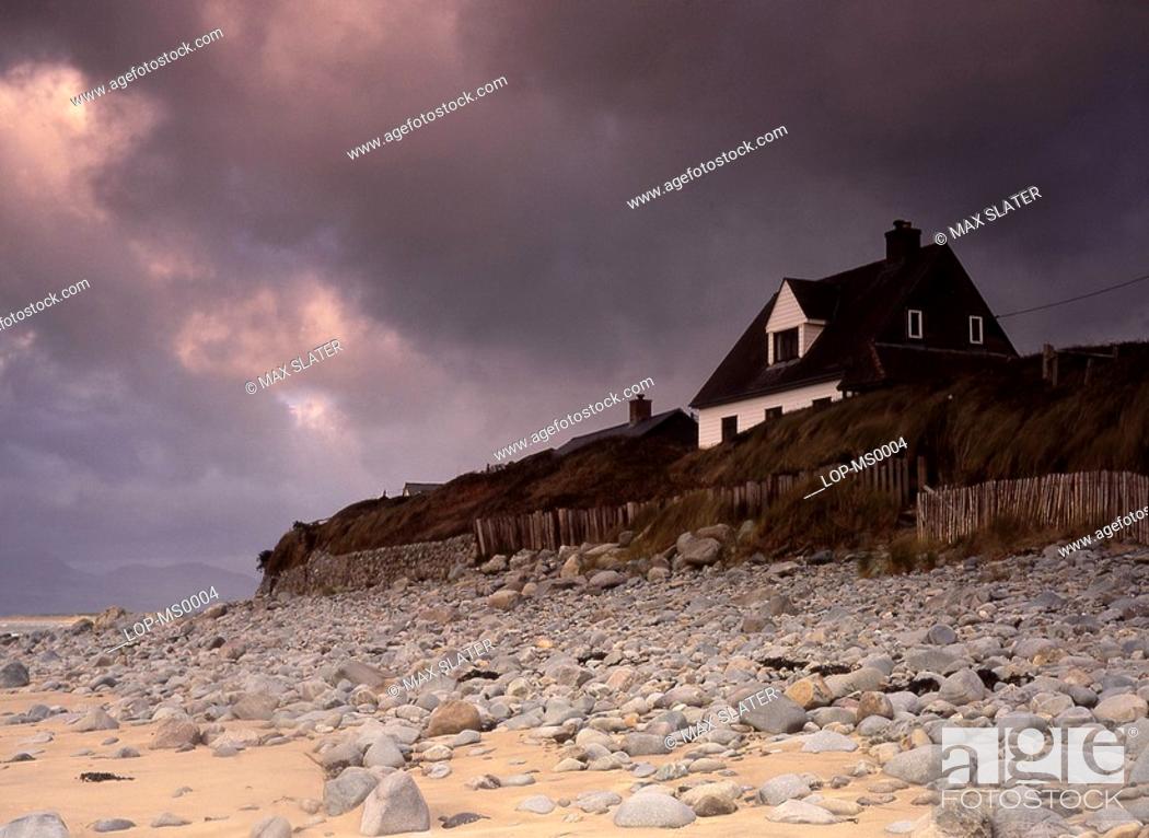 Stock Photo: Wales, Gwynedd, Harlech, A view of a beachside house.