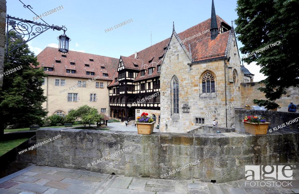Stock Photo: The Veste Coburg with partial view of the princely building and the Luther chapel. The Veste Coburg rises high above the city with its huge walls and towers.