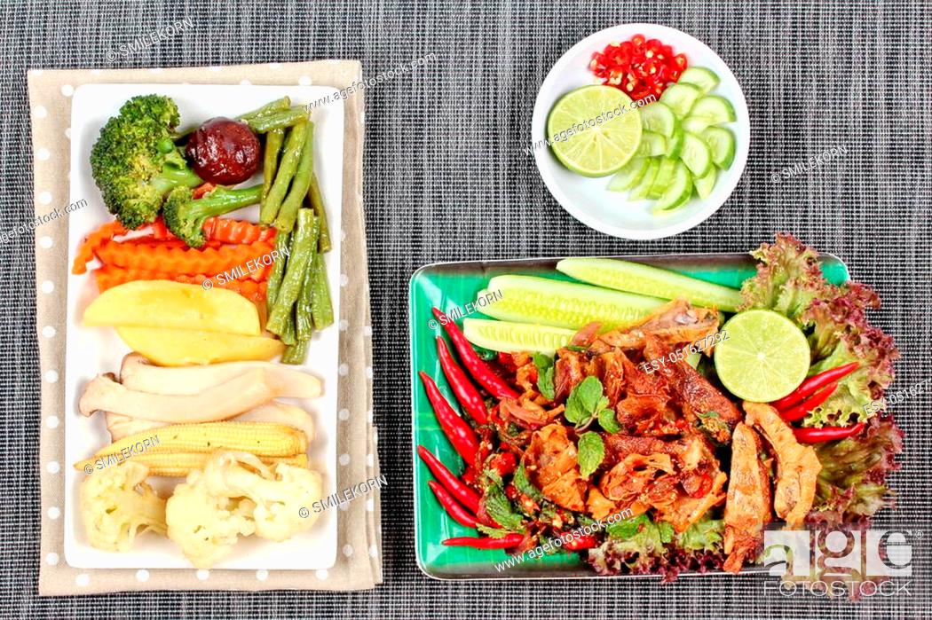 Stock Photo: Chinese Vegetable festival food as fried basil with mixed vegetables served deep fried spring roll and French fries are food for Chinese Vegetable festival of.