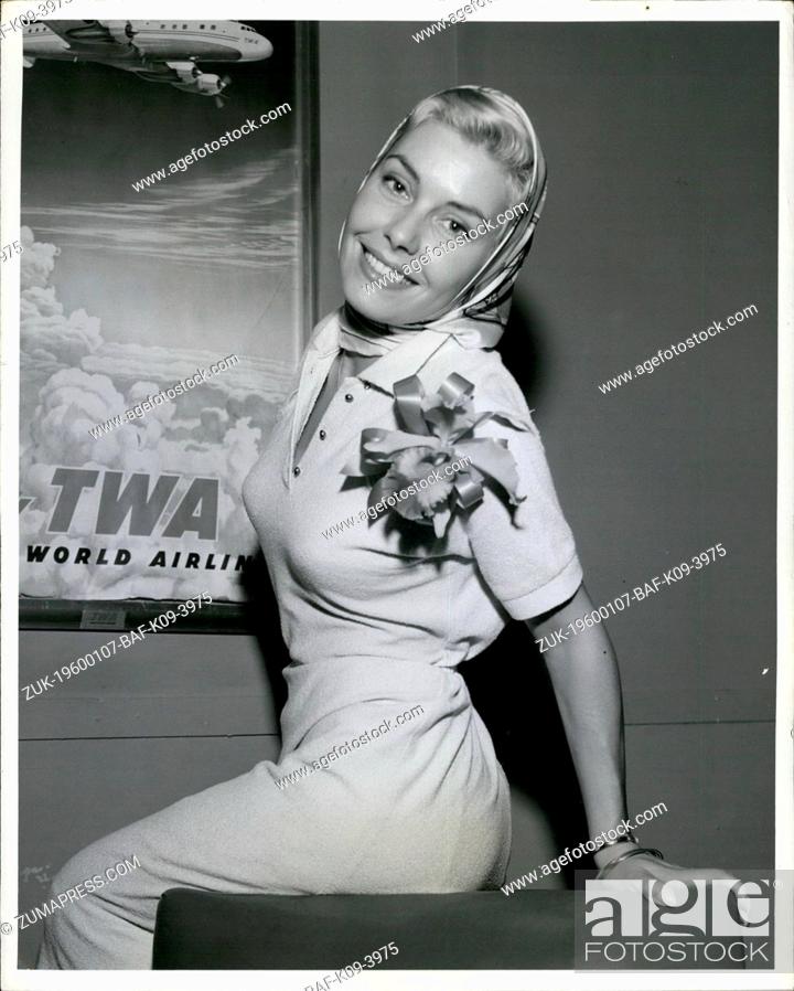 Stock Photo: 1968 - Idlewind Airport, N.Y., October 4 An orchid awaited lovely Italian movie actress, Rossana Rory, on her arrival, via TWA to rainy New York, from Rome.