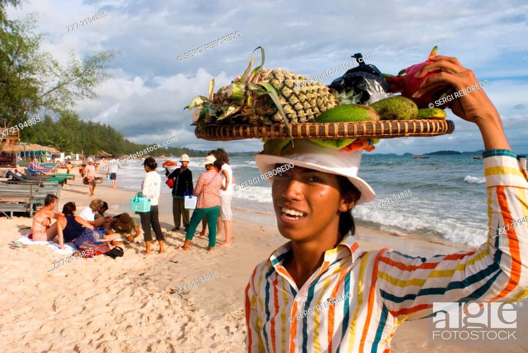 Stock Photo: Fruit sellers on the beach in Sihanoukville. Sihanoukville, it’s the 4th largest city in Cambodia but it’s really a beachside town, and it is incredible.