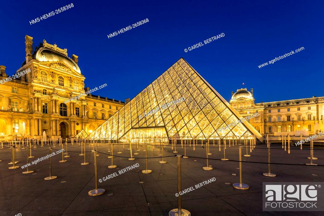 Stock Photo: France, Paris, area listed as World Heritage by UNESCO, the Louvre Pyramid by the architect IM Pei and facade of the Cour Napoleon.