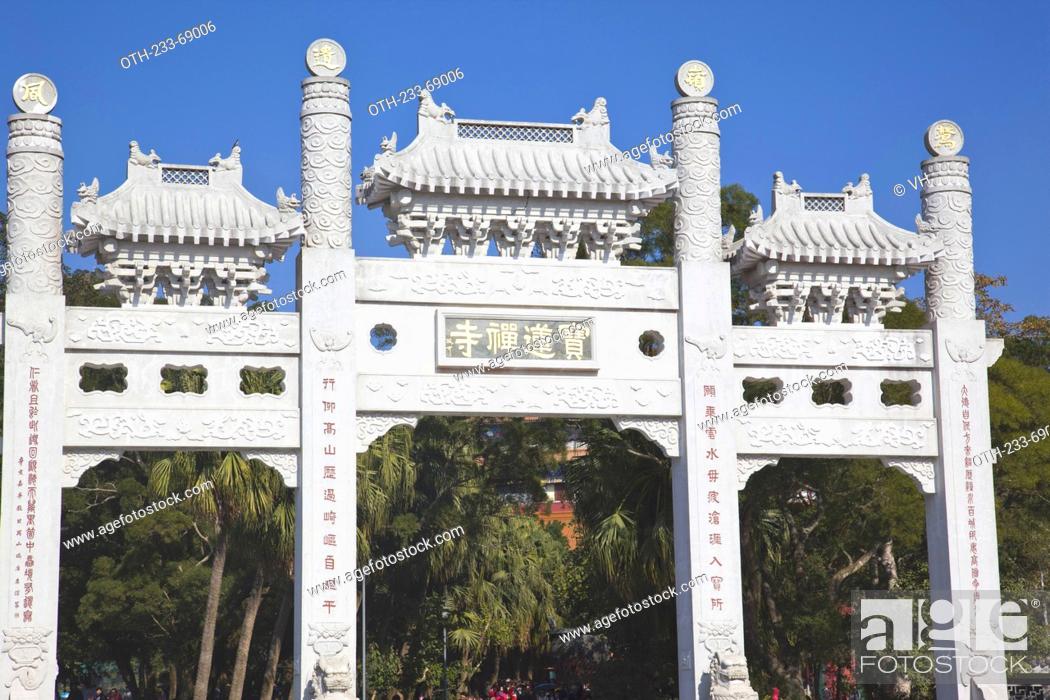 Stock Photo: White gateway on the approach to the Po Lin Monastery, Lantau Island, Hong Kong.