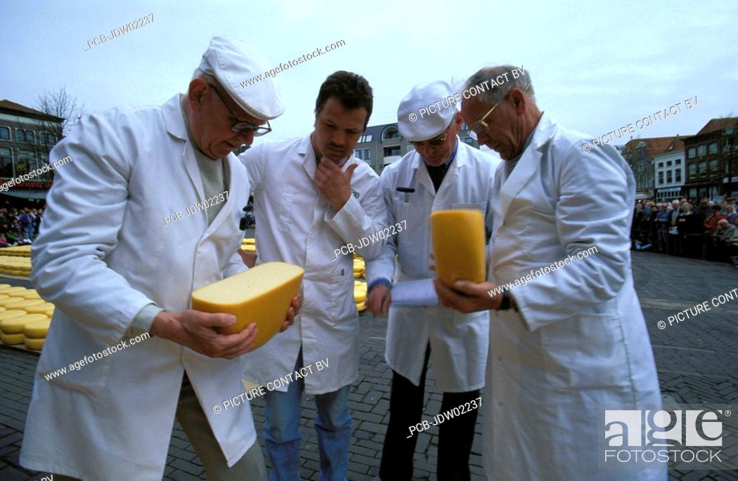 Stock Photo: Alkmaar, cheese inspectors at the traditional cheese market.