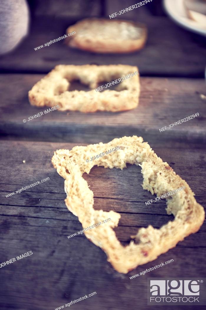 Stock Photo: Hole in slice of bread.