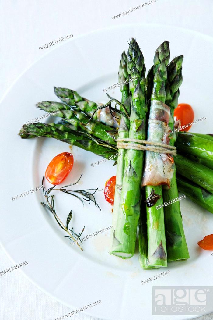Stock Photo: Asparagus on plate.