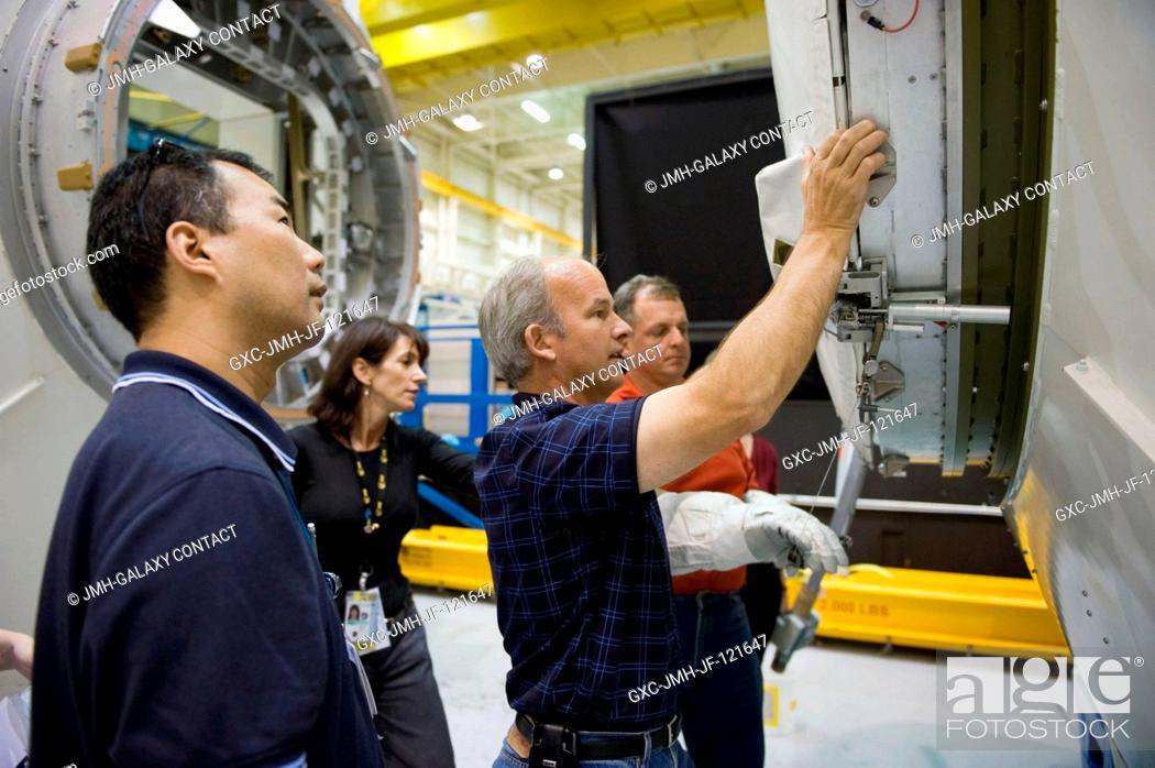 Stock Photo: NASA astronaut Jeffrey Williams (right foreground), Expedition 21 flight engineer and Expedition 22 commander; along with Japan Aerospace Exploration Agency.