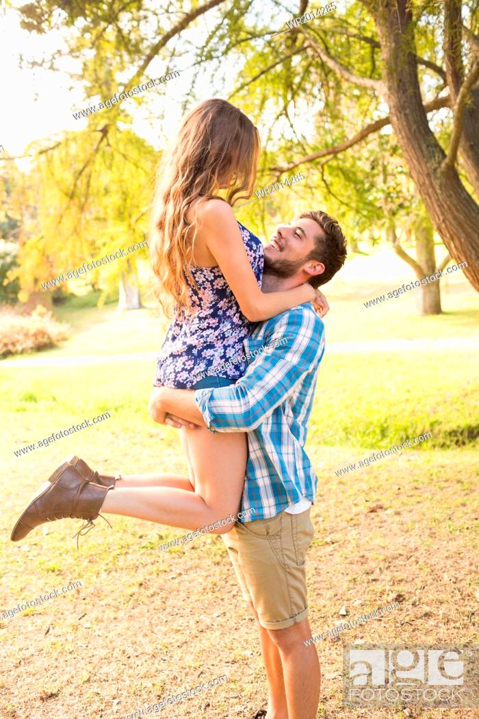 Cute couple hugging in the park, Stock Photo, Picture And Royalty Free  Image. Pic. WR2014285 | agefotostock