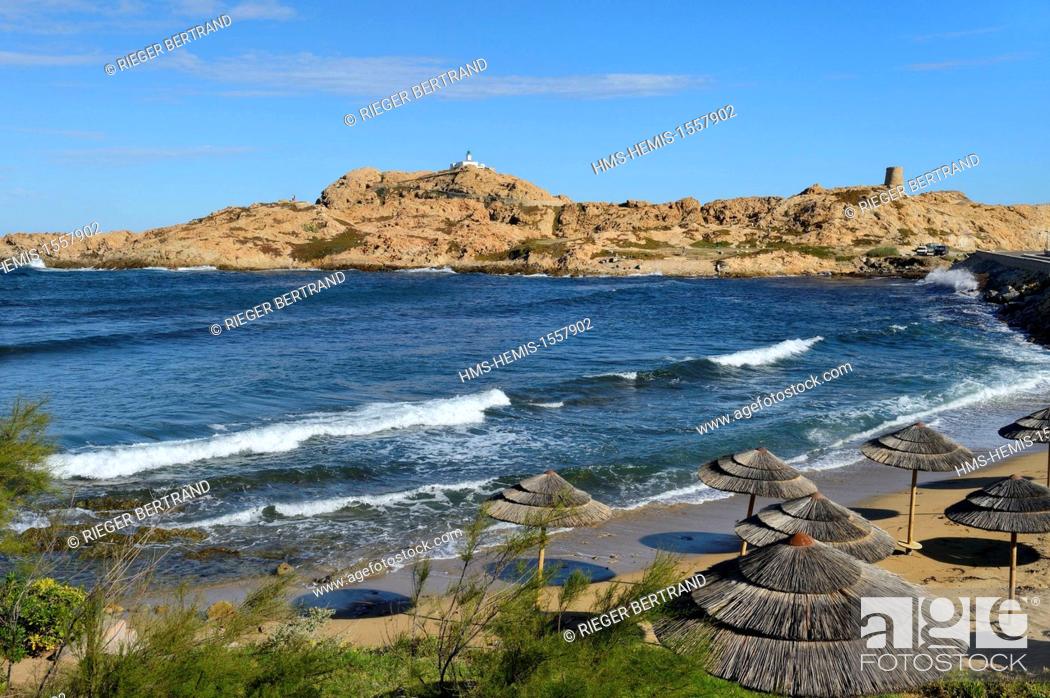 Stock Photo: France, Haute Corse, Balagne, L'Ile Rousse, the Pietra Lighthouse and the 15th century Genoese tower behind the beach.