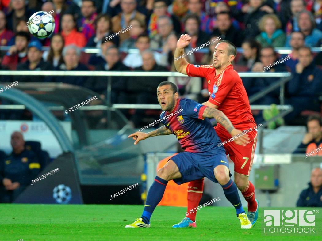 Stock Photo: Barcelona's Daniel Alves and Munich's Franck Ribery (R) vie for the ball during the UEFA Champions League semi final second leg soccer match between FC.